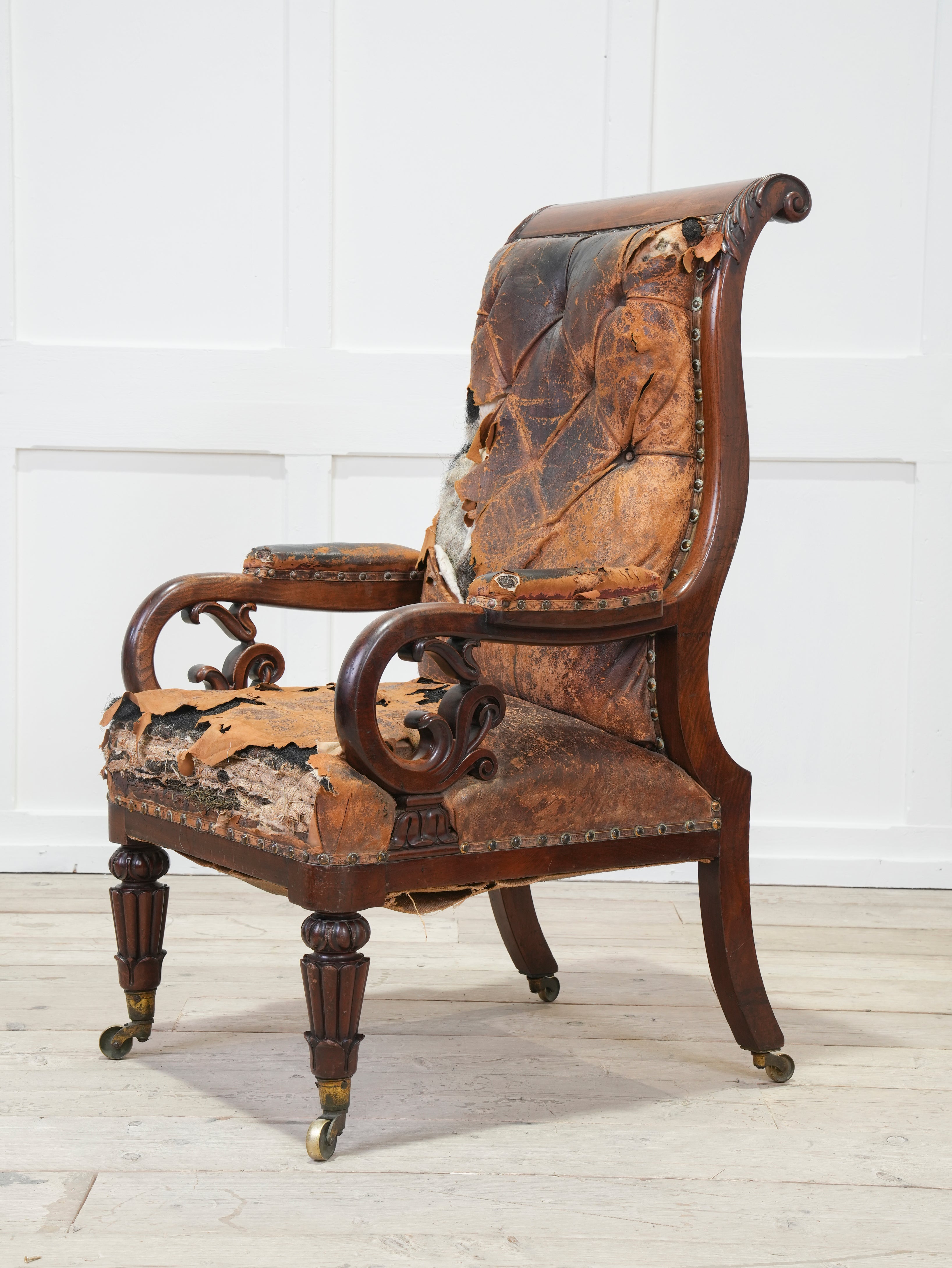 A 19th Century Neo- Classical Mahogany Library Chair