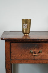 A Brass Beaker by Magrit Tevan