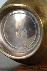 A Brass Beaker by Magrit Tevan