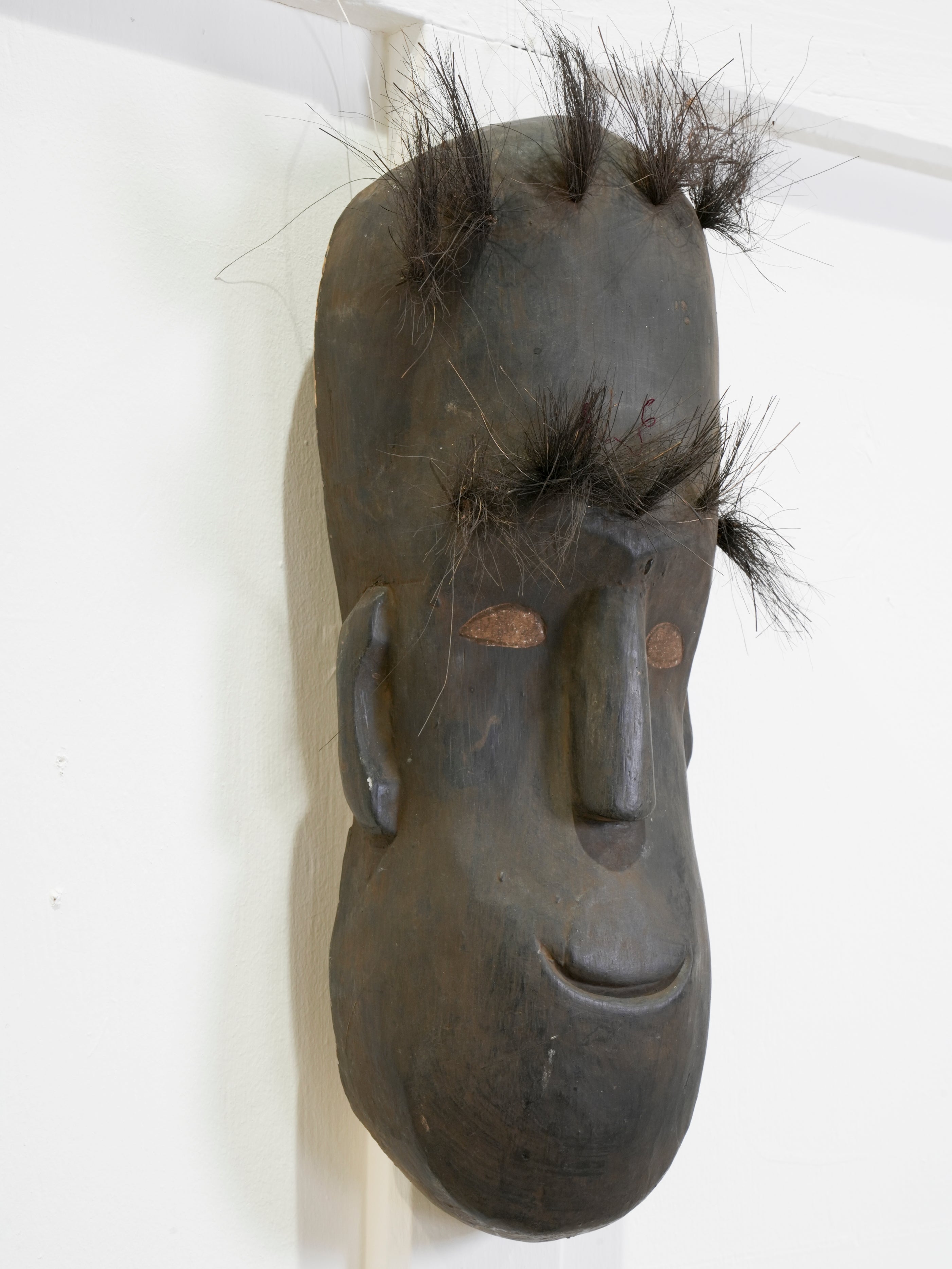 A Carved Timber African Mask