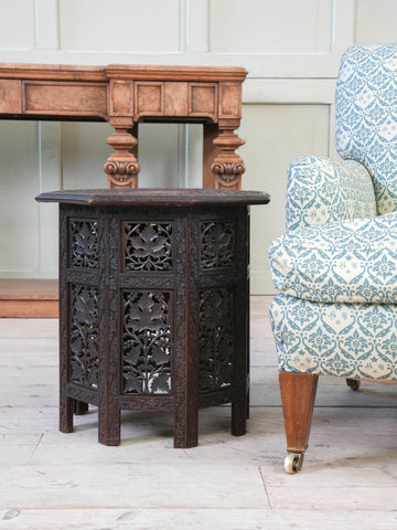 A Carved Indian Folding Occasional Table