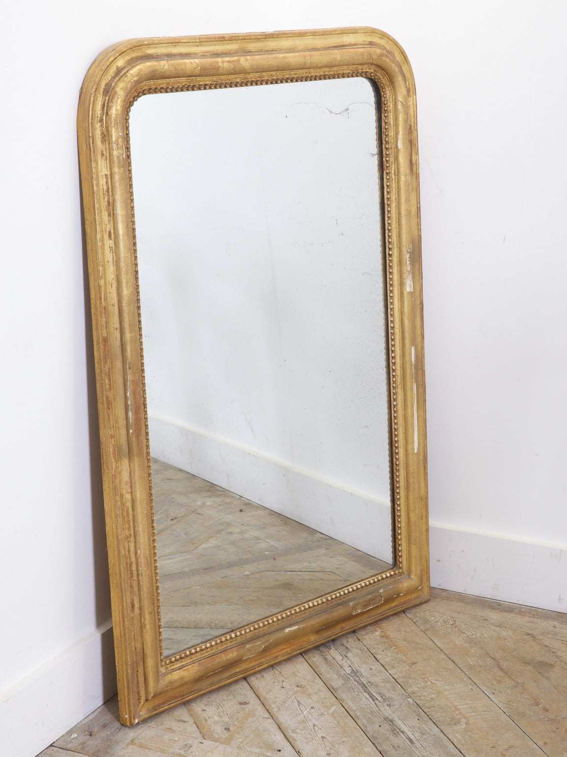 19th century French Louis Philippe mirror with gilt finish.