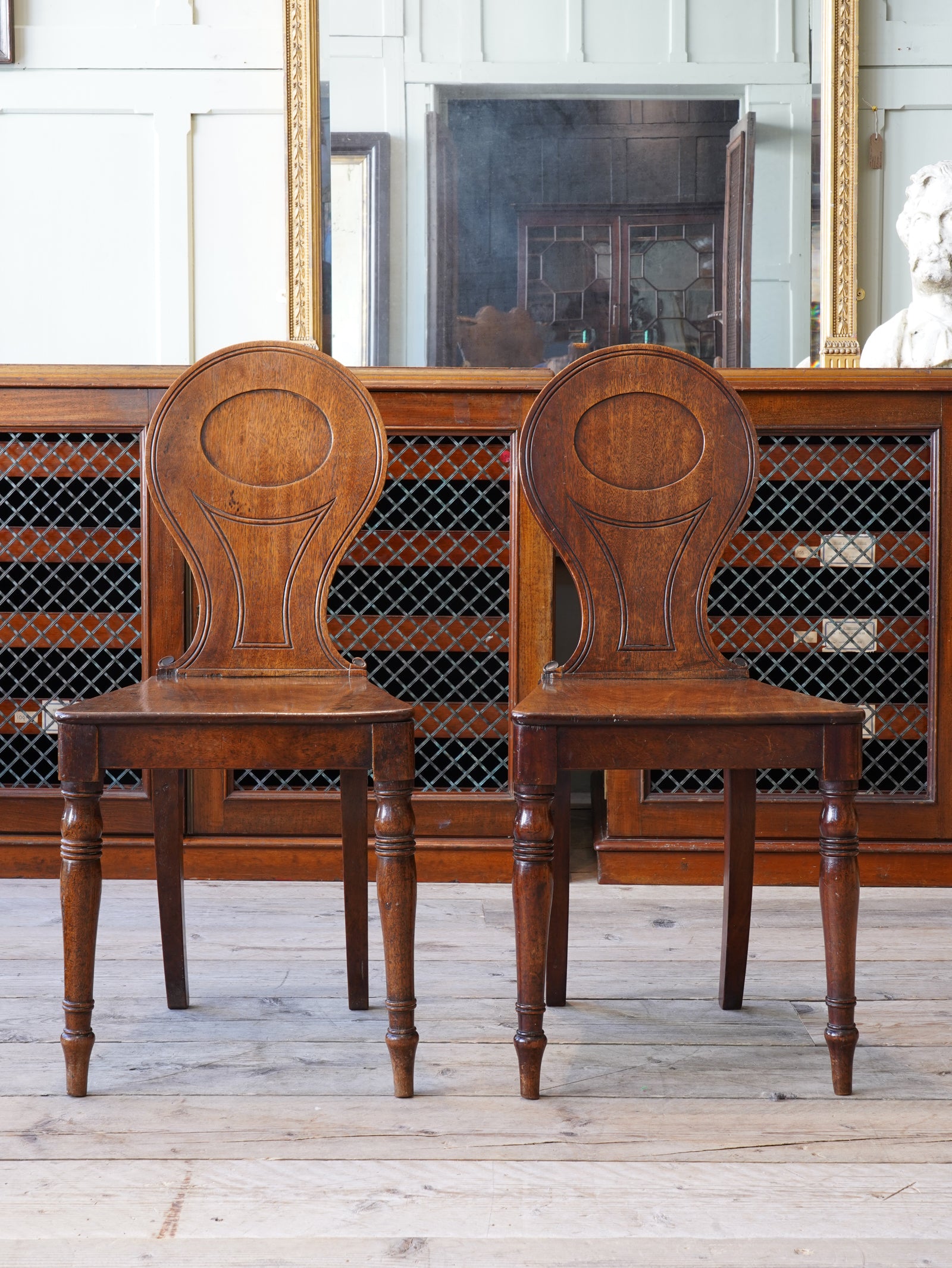 A Pair of 19th century Mahogany Hall Chairs