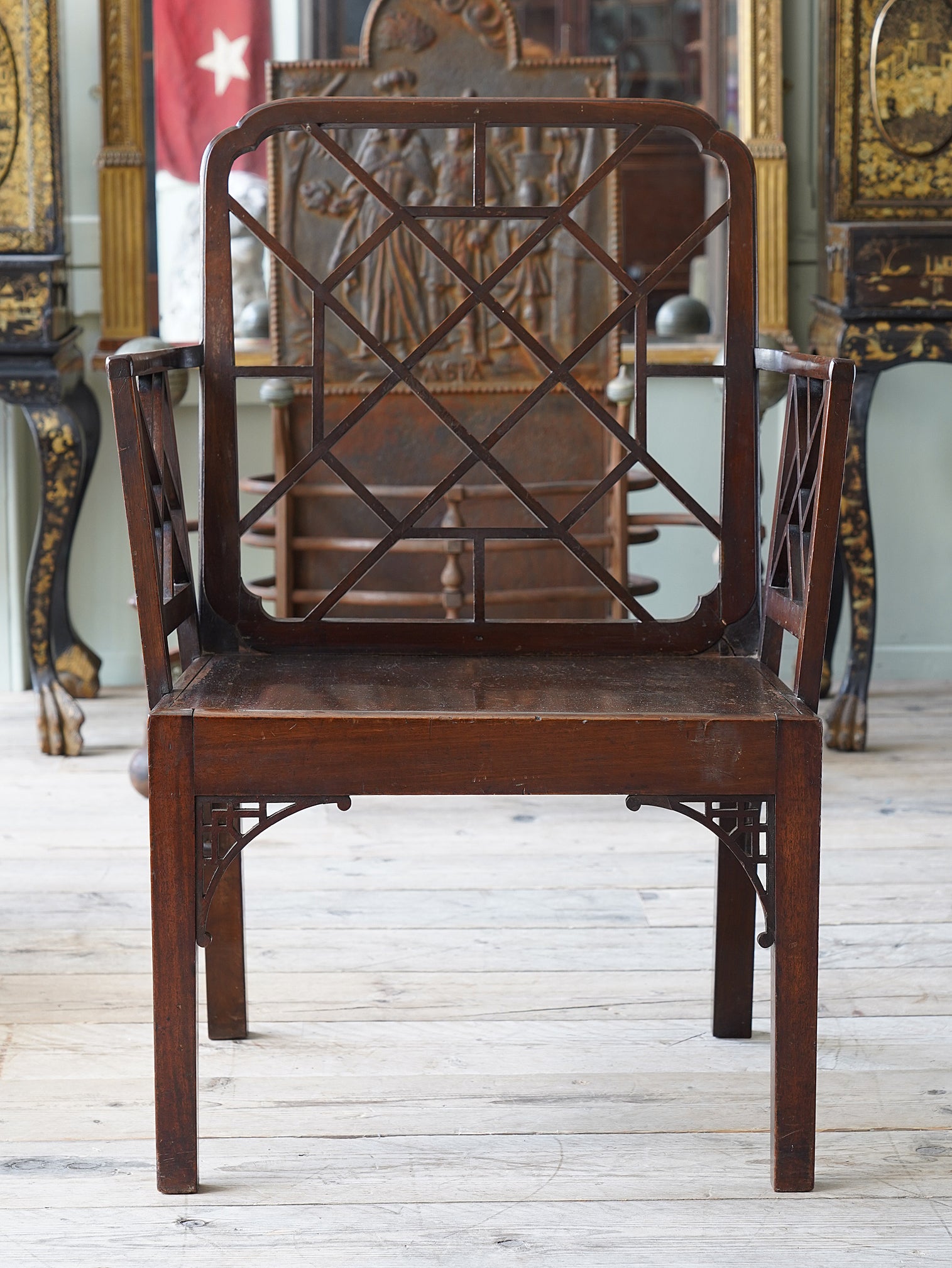 A George III Chippendale Chinese Design Arm Chair