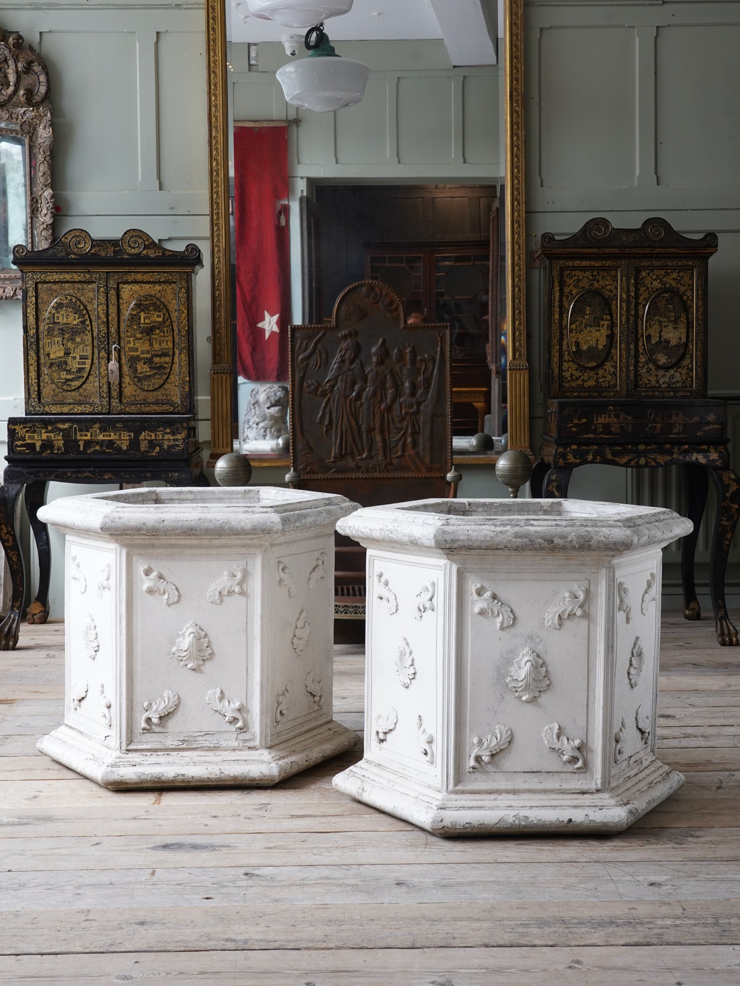 A Pair of Painted Composition Stone Planters