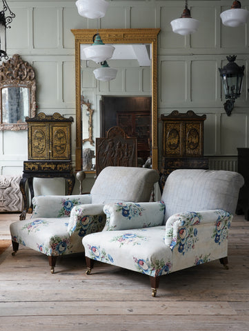 A Pair of Large Howard & Son Armchairs