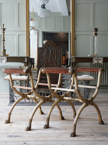 A Pair of X Frame Stools by Morel & Hughes