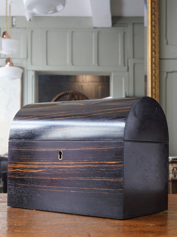 A mid 19th Century Dome Ebony Tea Caddy