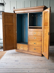 A 19th century Satin Birch Compactum Wardrobe