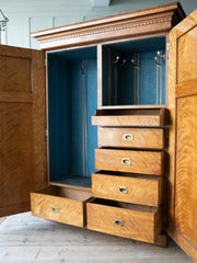 A 19th century Satin Birch Compactum Wardrobe