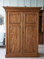 A 19th century Satin Birch Compactum Wardrobe