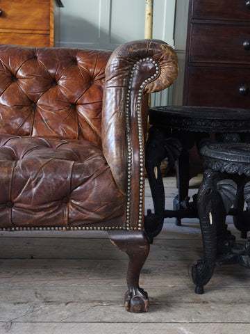 A Tan Leather Buttoned Sofa