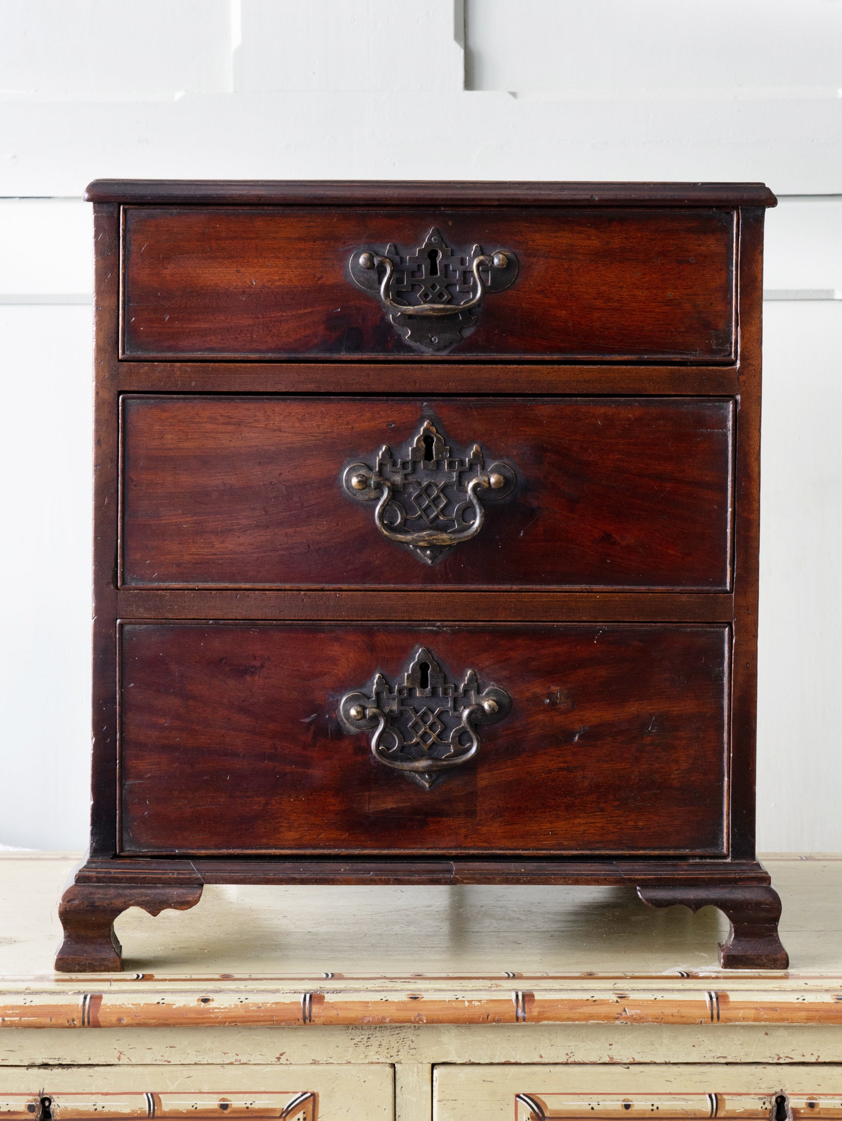 A Diminutive George III Mahogany Chest