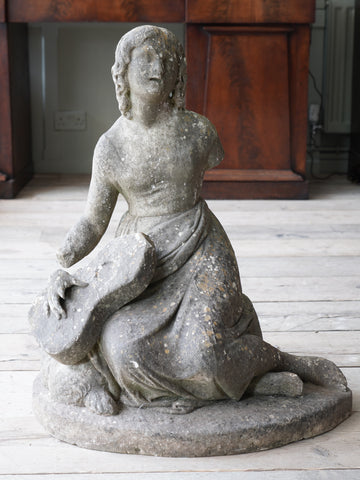 A Marble Seated Girl with Guitar