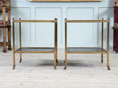 A Pair of Brass and Leather Side Tables