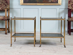 A Pair of Brass and Leather Side Tables