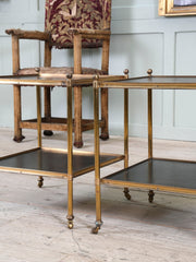 A Pair of Brass and Leather Side Tables