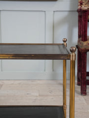 A Pair of Brass and Leather Side Tables