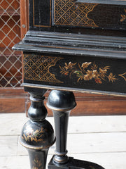 A 18th Century Chinoiserie Cabinet on Stand.