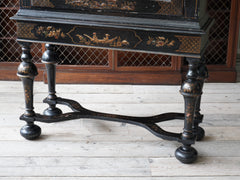 A 18th Century Chinoiserie Cabinet on Stand.