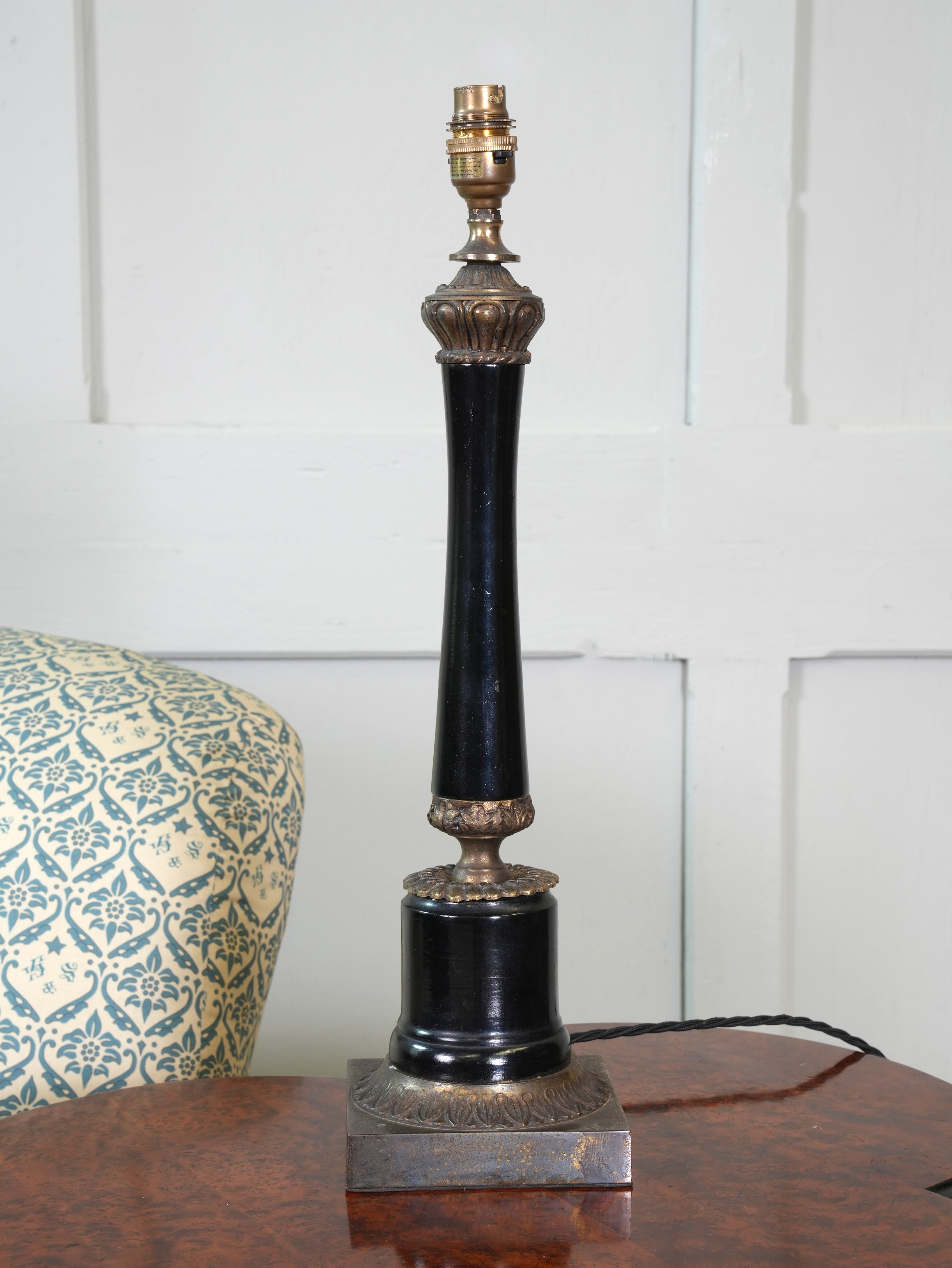 An Ebonised Timber Table Lamp