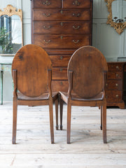 A Pair of George III Side Chairs in the manner of Mayhew & Ince