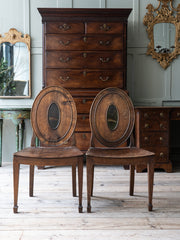 A Pair of George III Side Chairs in the manner of Mayhew & Ince